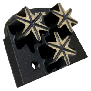 Black plastic tool block with three six-point star-shaped metal tips arranged in a row.